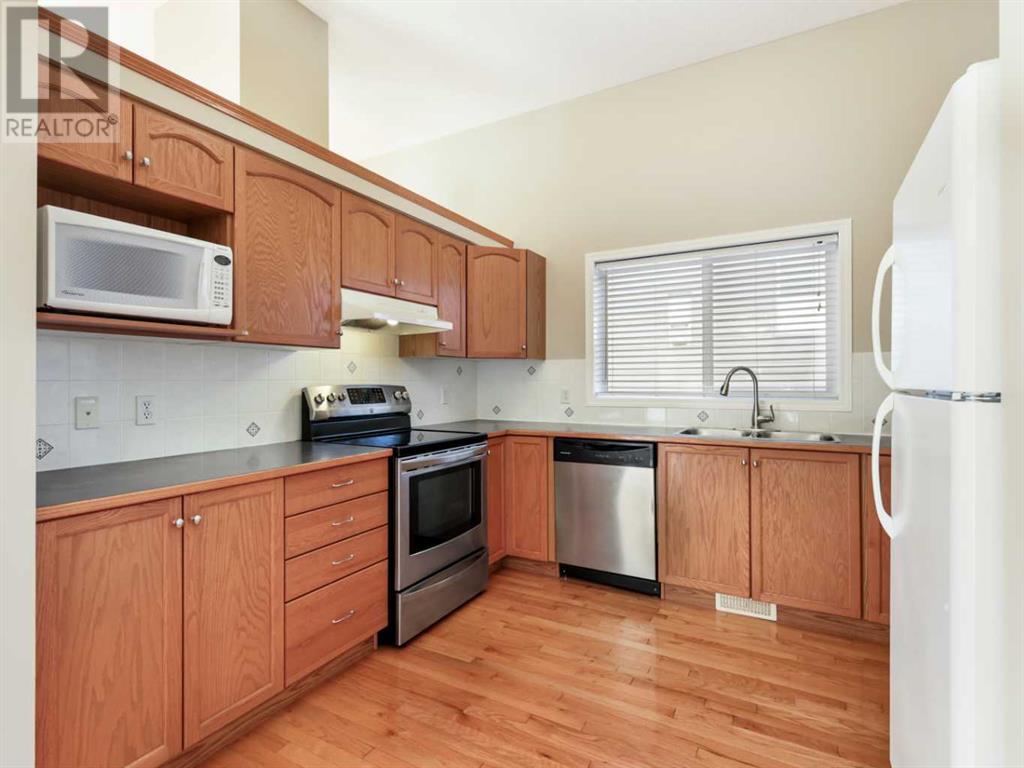 Single Family House 4 Level for Sale in  Eversyde Circle SW Evergreen Calgary 