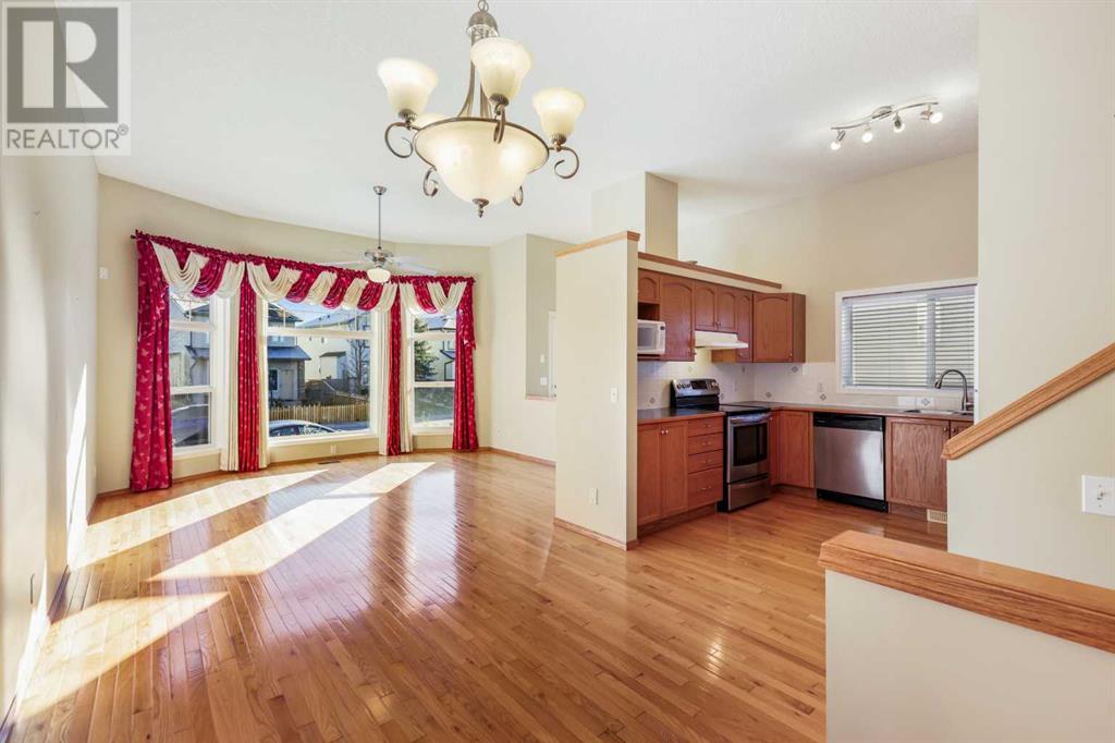 Single Family House 4 Level for Sale in  Eversyde Circle SW Evergreen Calgary 