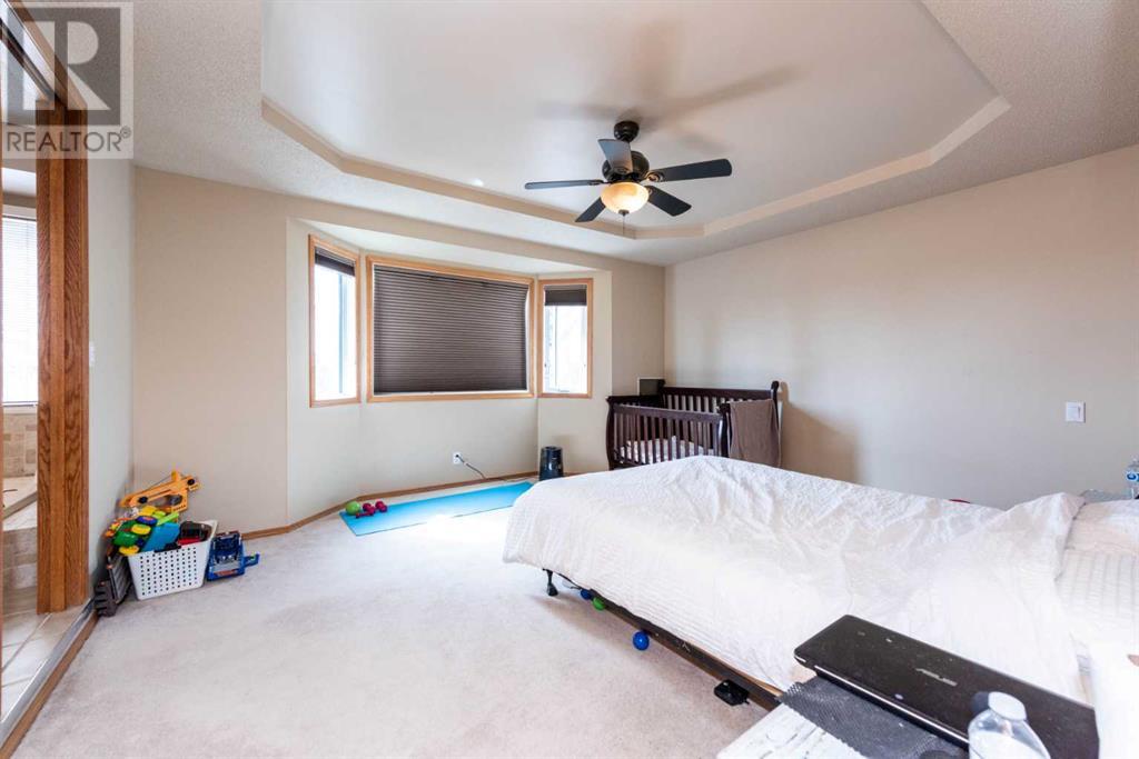 Single Family House for Sale in  Hawktree Circle NW Hawkwood Calgary 