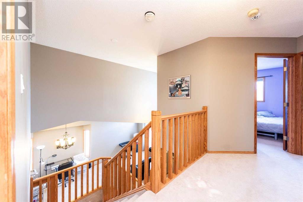 Single Family House for Sale in  Hawktree Circle NW Hawkwood Calgary 