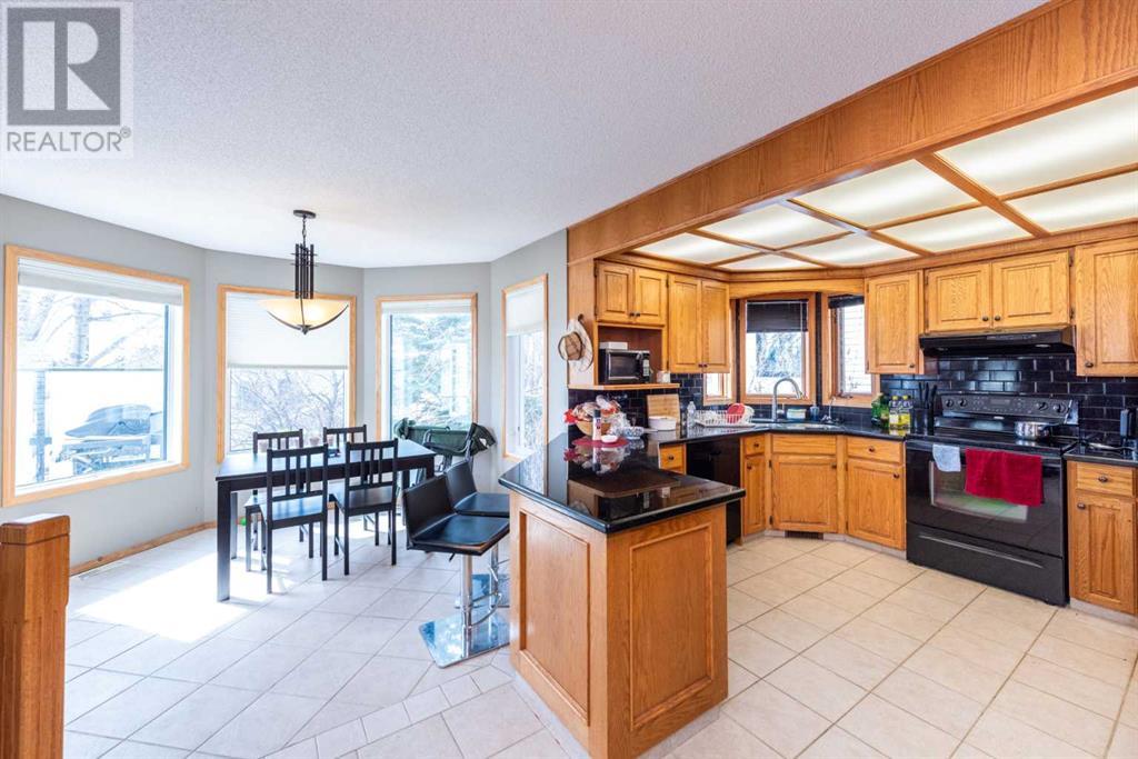 Single Family House for Sale in  Hawktree Circle NW Hawkwood Calgary 