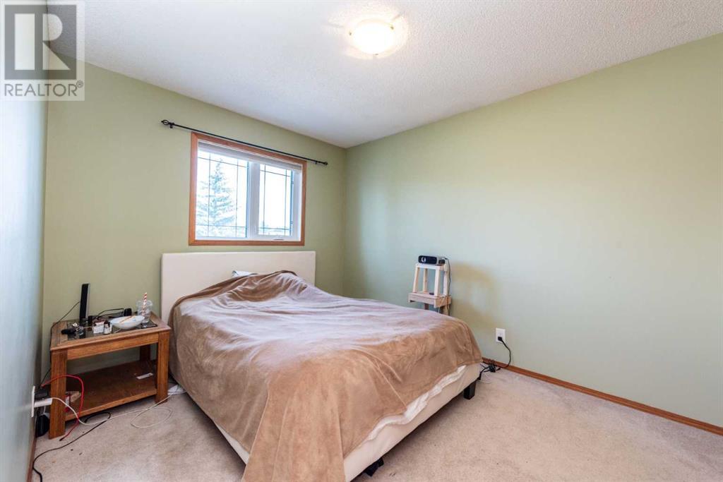Single Family House for Sale in  Hawktree Circle NW Hawkwood Calgary 