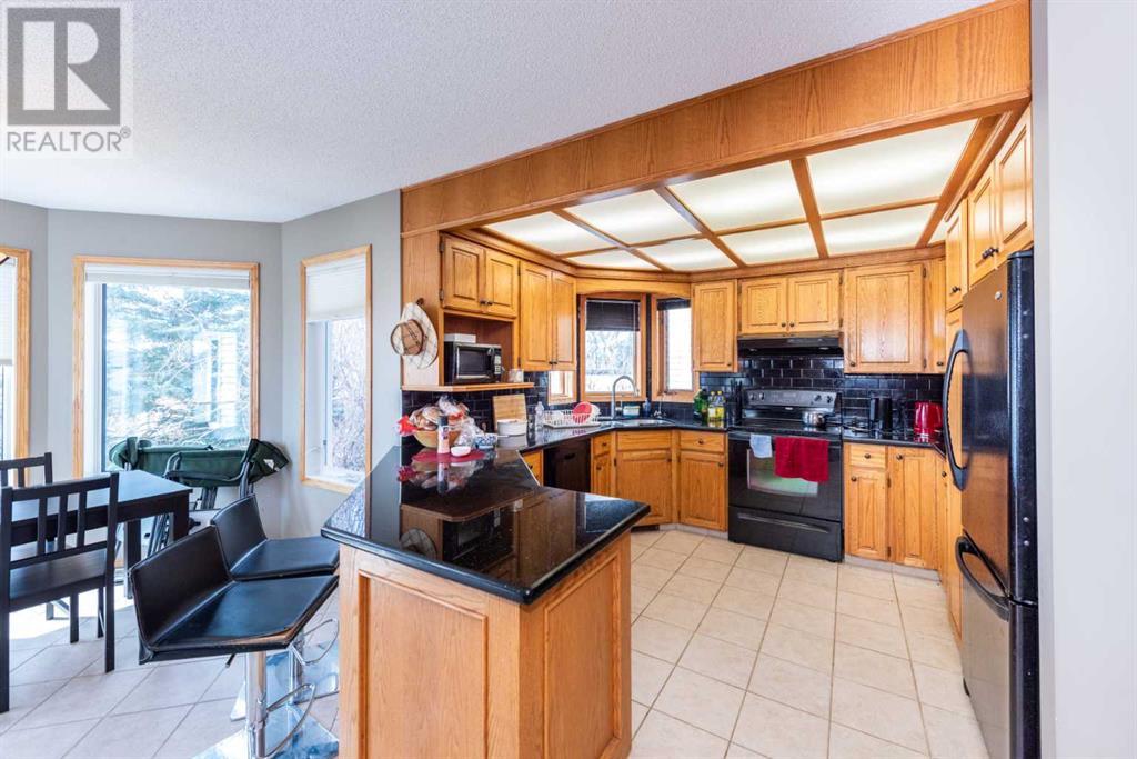 Single Family House for Sale in  Hawktree Circle NW Hawkwood Calgary 