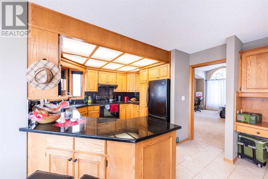 Single Family House for Sale in  Hawktree Circle NW Hawkwood Calgary 