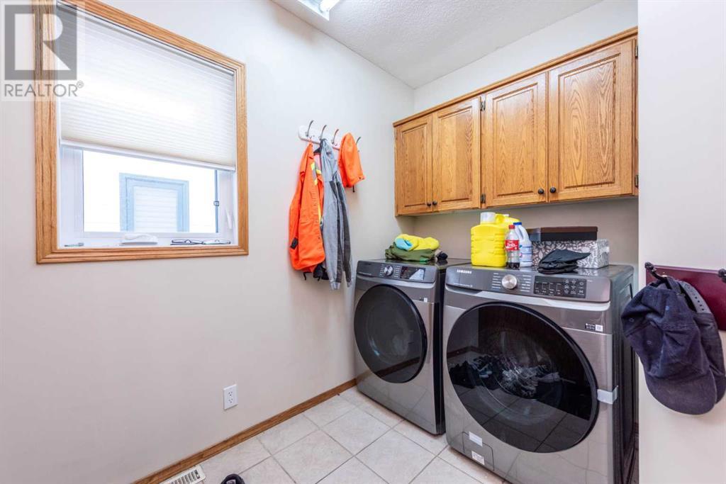 Single Family House for Sale in  Hawktree Circle NW Hawkwood Calgary 