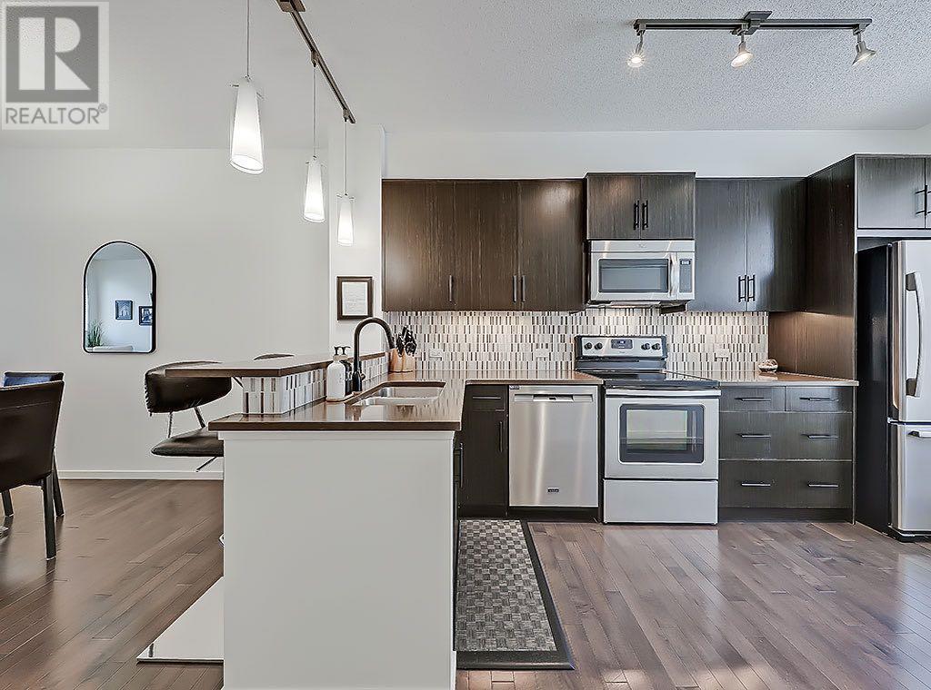 Single Family House for Sale in  Ascot Circle SW Aspen Woods Calgary 