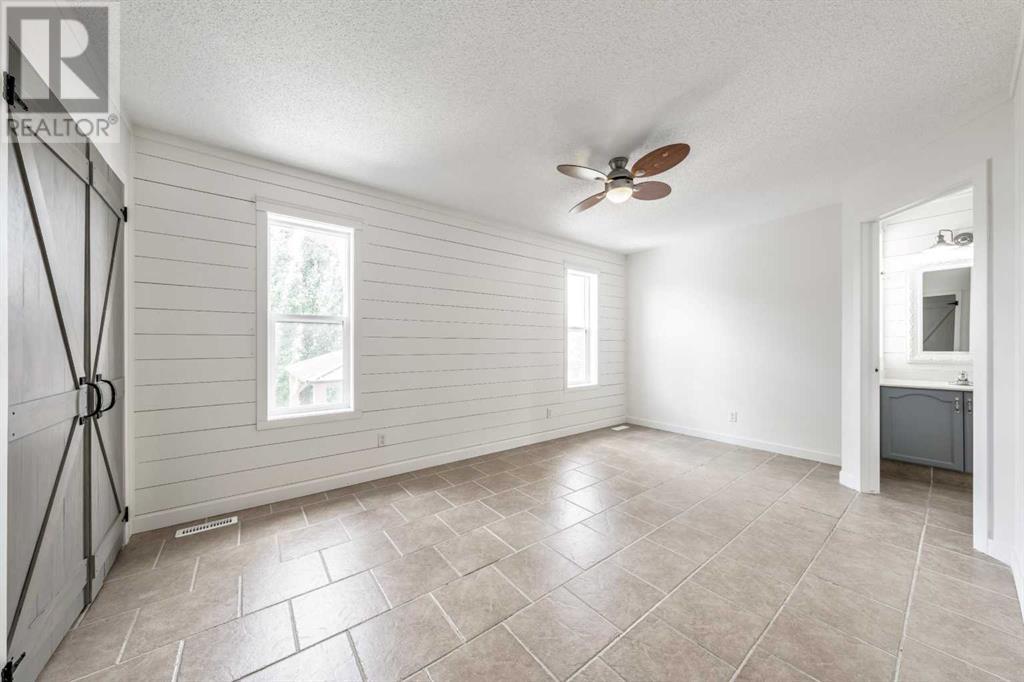 Single Family House Bi-level for Sale in  Coventry Drive NE Coventry Hills Calgary 
