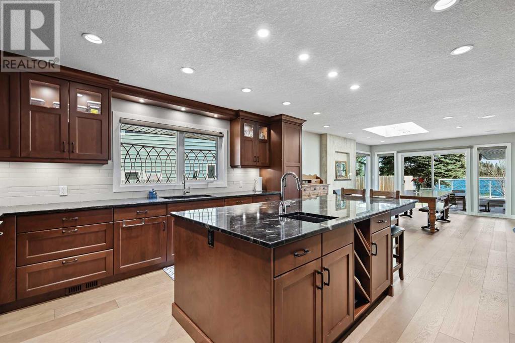 Single Family House Bungalow for Sale in  Midpark Crescent SE Midnapore Calgary 
