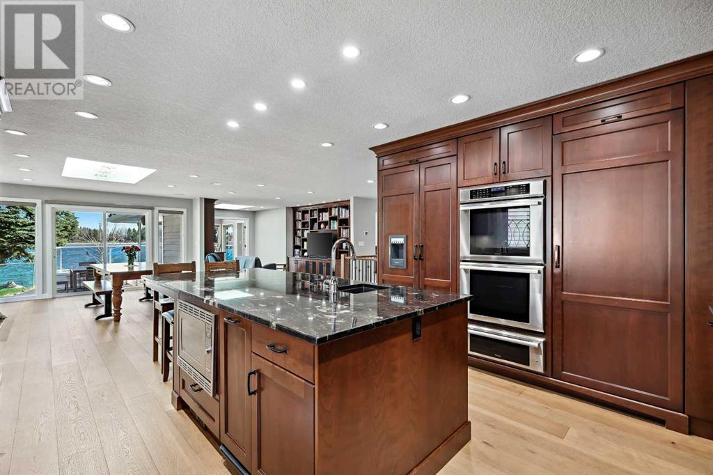Single Family House Bungalow for Sale in  Midpark Crescent SE Midnapore Calgary 