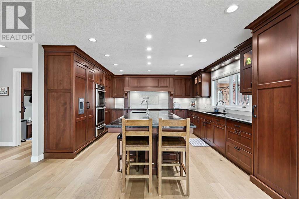 Single Family House Bungalow for Sale in  Midpark Crescent SE Midnapore Calgary 