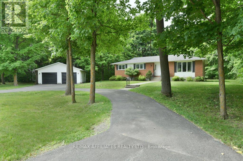 Large private in town, treed lot.