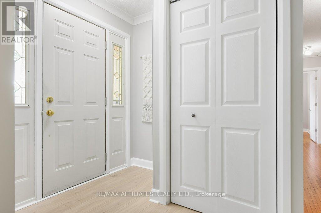 Welcoming foyer with closet.