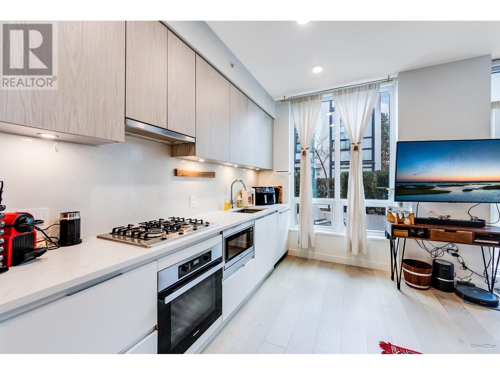 Photo 3 of 102 4240 Cambie Street, Vancouver BC