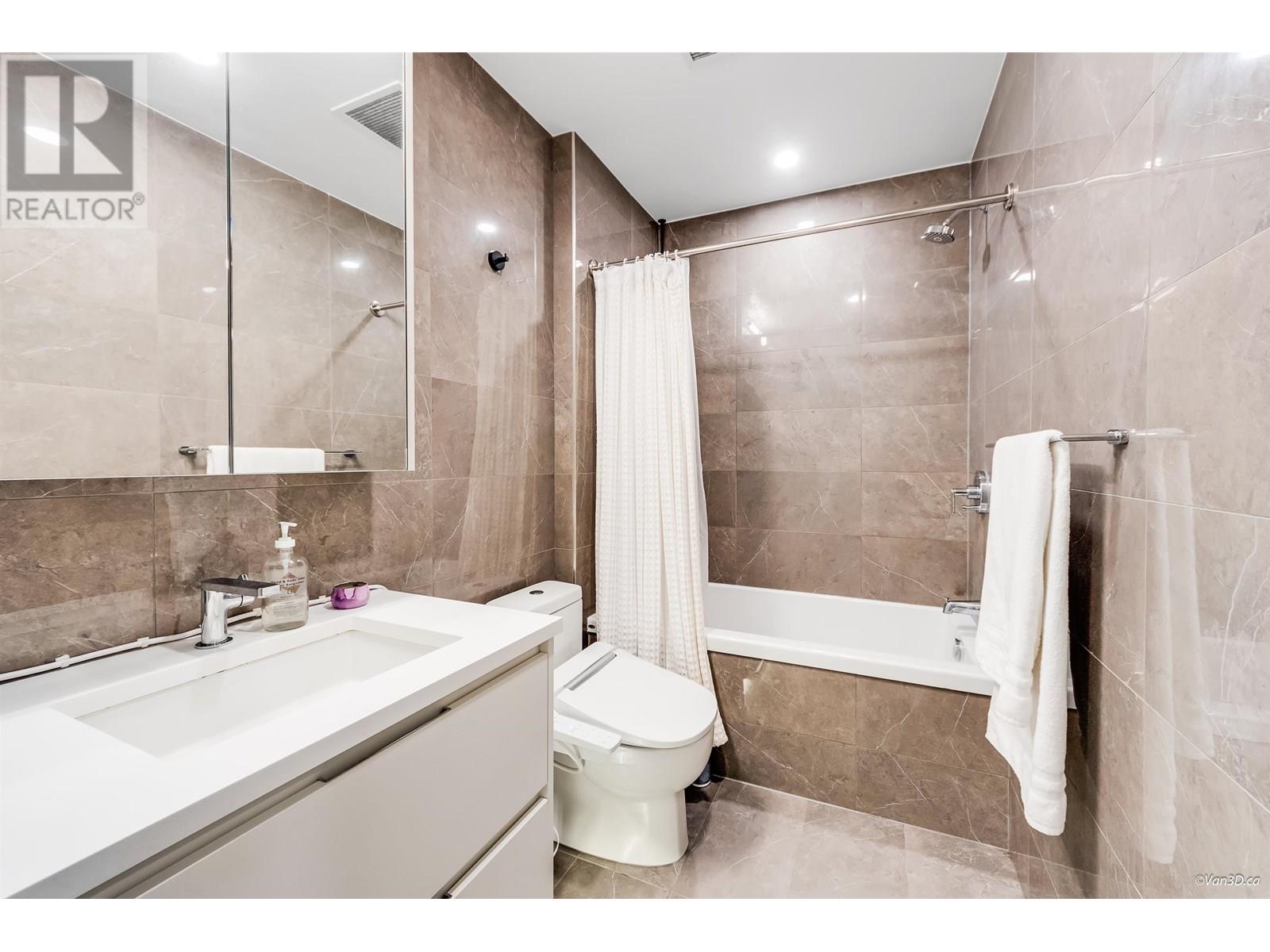 Photo 2 of 102 4240 Cambie Street, Vancouver BC