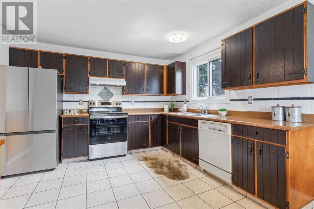 Single Family House Bungalow for Sale in  Fallswater Road NE Falconridge Calgary 