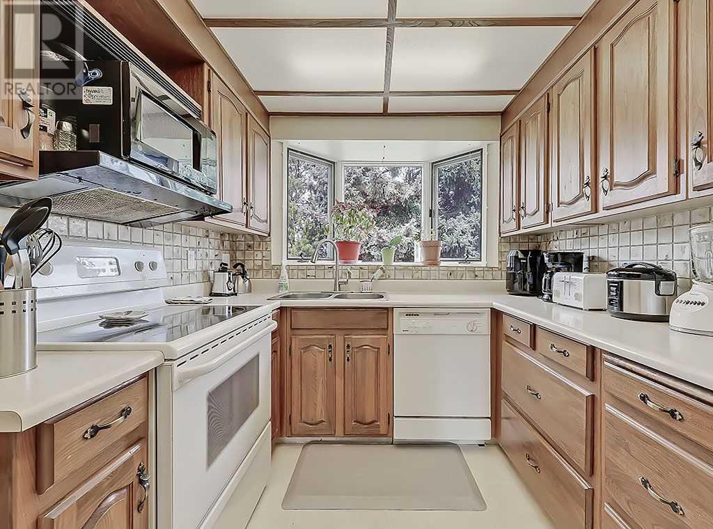 Single Family House Bungalow for Sale in  Braxton Road SW Braeside Calgary 