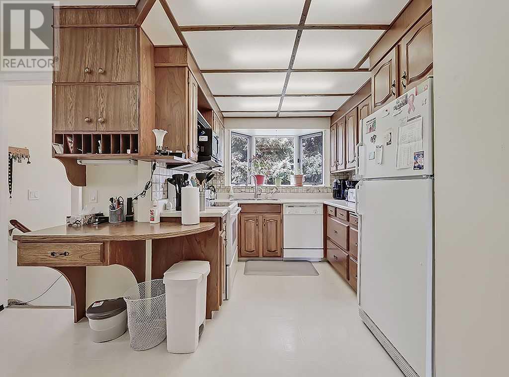 Single Family House Bungalow for Sale in  Braxton Road SW Braeside Calgary 