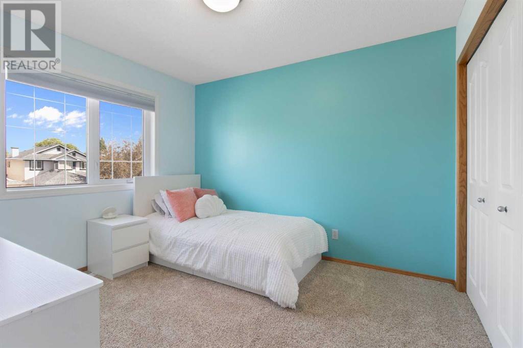 Single Family House for Sale in  Everwillow Close SW Evergreen Calgary 