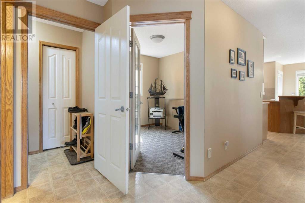 Single Family House for Sale in  Everwillow Close SW Evergreen Calgary 