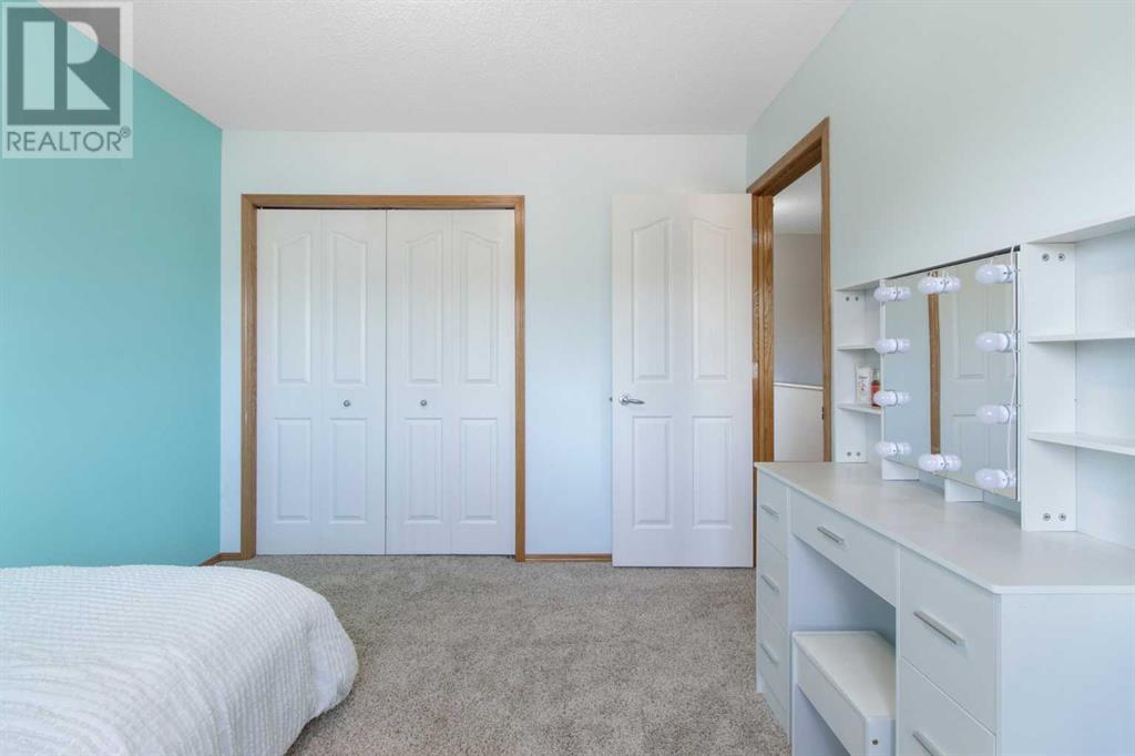 Single Family House for Sale in  Everwillow Close SW Evergreen Calgary 