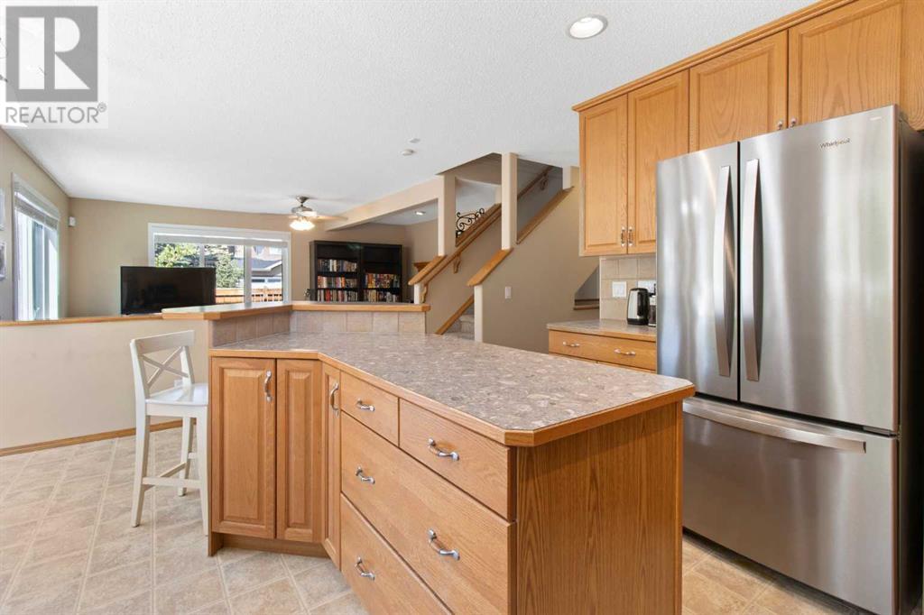 Single Family House for Sale in  Everwillow Close SW Evergreen Calgary 