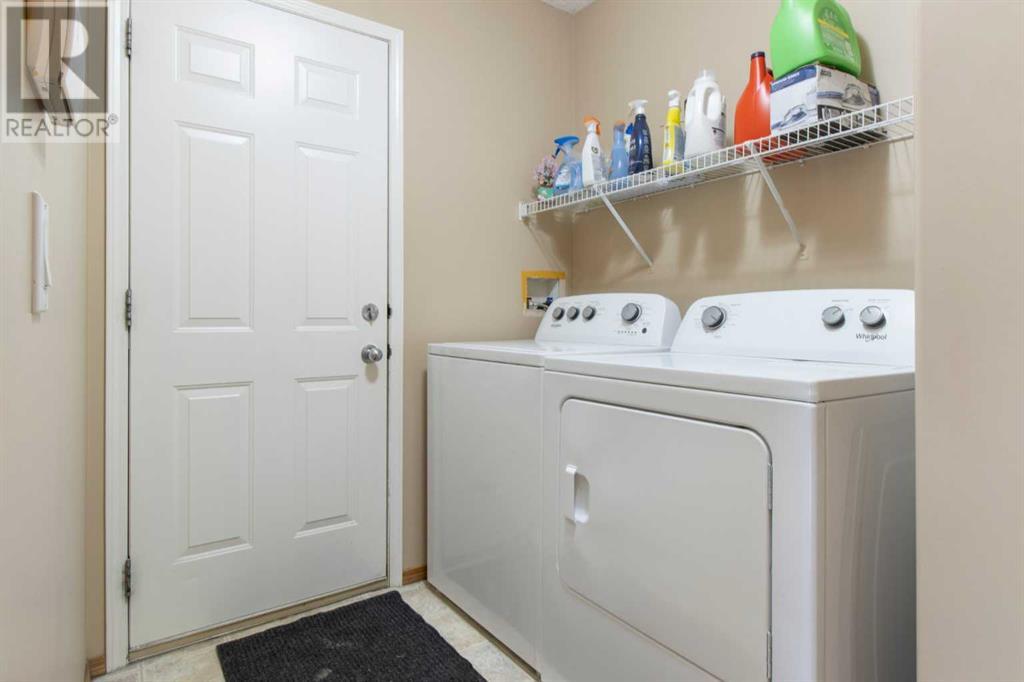 Single Family House for Sale in  Everwillow Close SW Evergreen Calgary 