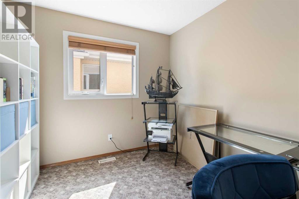Single Family House for Sale in  Everwillow Close SW Evergreen Calgary 