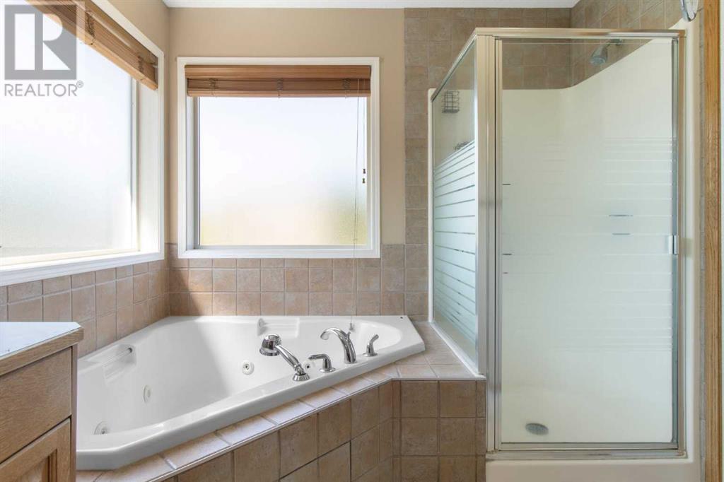 Single Family House for Sale in  Everwillow Close SW Evergreen Calgary 