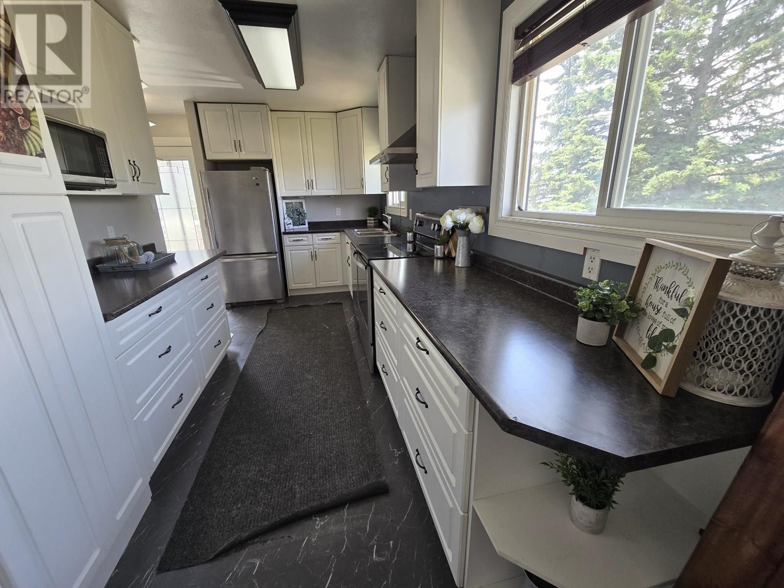 Photo 5 of 8919 91 Street, Fort St John BC