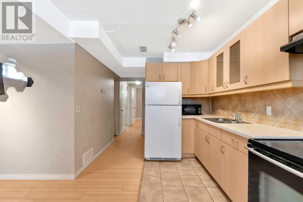 Single Family House Bi-level for Sale in  Canfield Road SW Canyon Meadows Calgary 