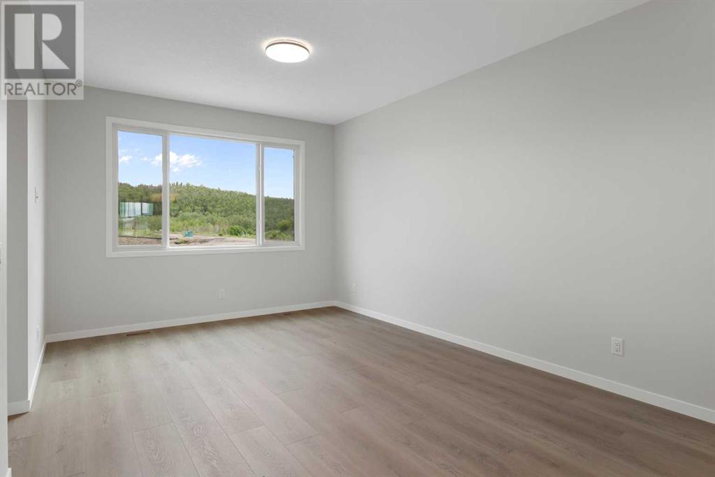 Single Family House for Sale in  Creekview Drive SW Pine Creek Calgary 