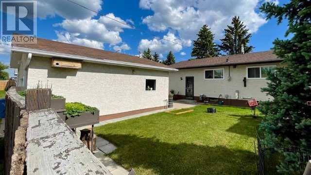 Single Family House Bungalow for Sale in  Manora Rise NE Marlborough Park Calgary 