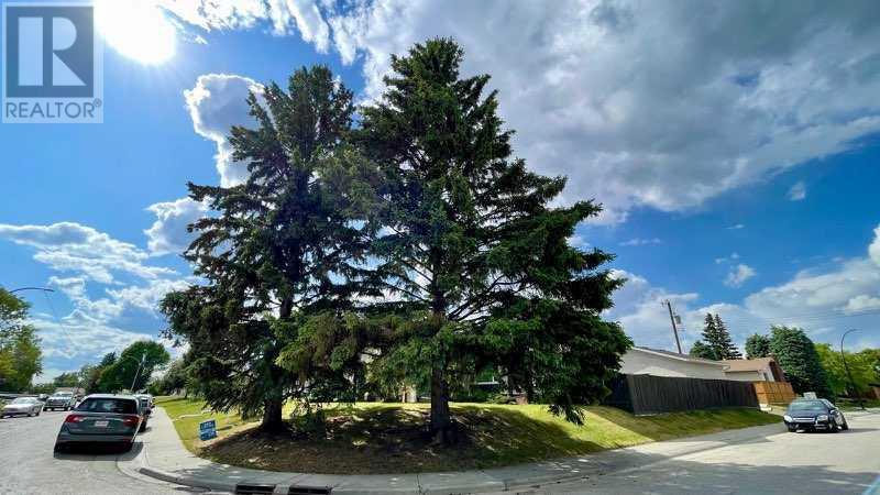 Single Family House Bungalow for Sale in  Manora Rise NE Marlborough Park Calgary 