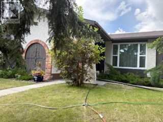 Single Family House Bungalow for Sale in  Manora Rise NE Marlborough Park Calgary 