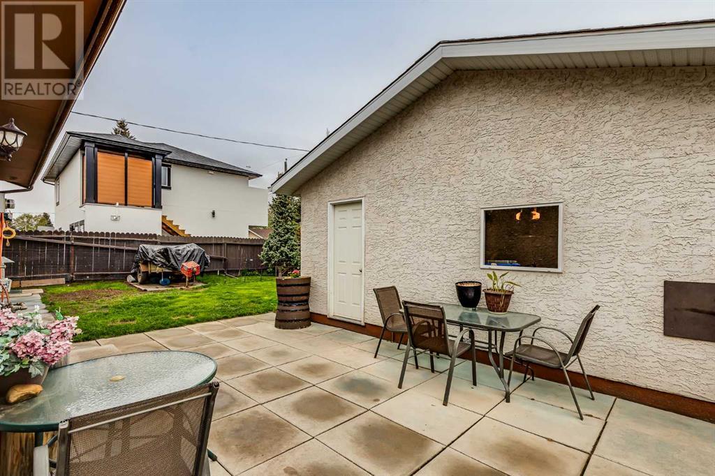 Single Family House Bungalow for Sale in  Manora Rise NE Marlborough Park Calgary 