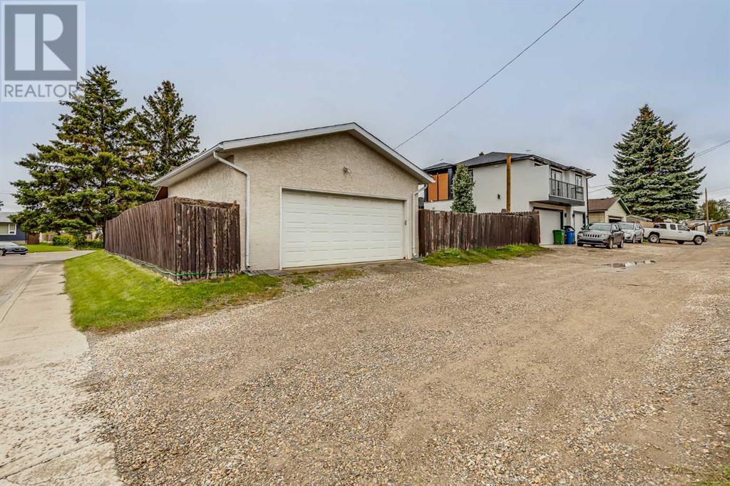 Single Family House Bungalow for Sale in  Manora Rise NE Marlborough Park Calgary 