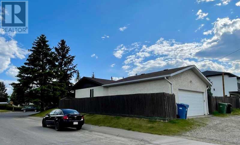 Single Family House Bungalow for Sale in  Manora Rise NE Marlborough Park Calgary 