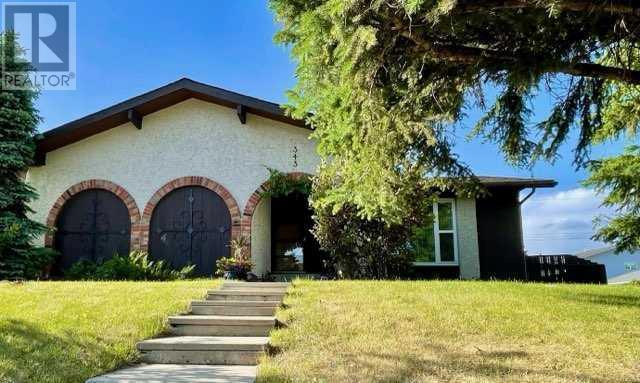 Single Family House Bungalow for Sale in  Manora Rise NE Marlborough Park Calgary 