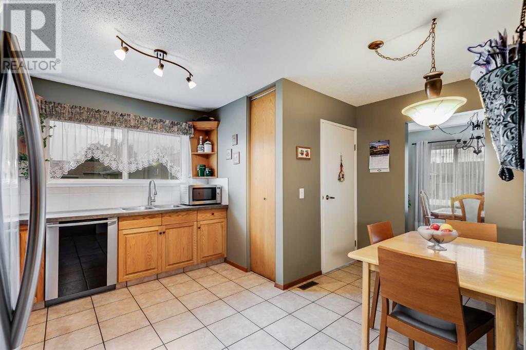 Single Family House Bungalow for Sale in  Manora Rise NE Marlborough Park Calgary 