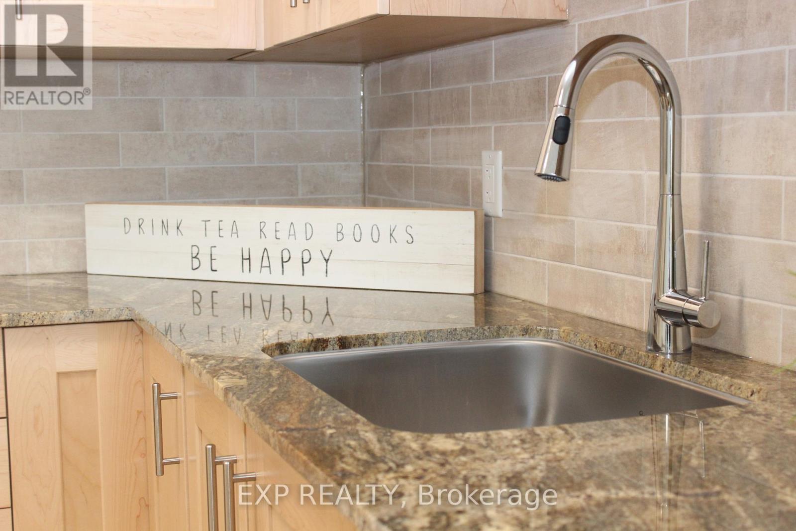 Granite Counter tops and Maple cabinetry