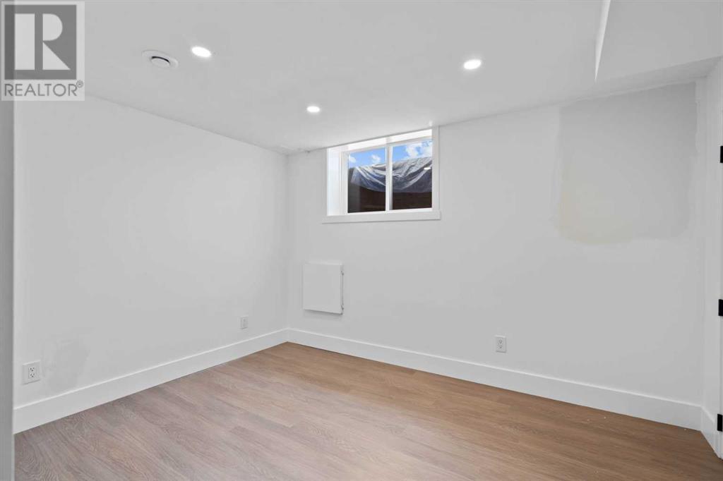 Single Family House Bungalow for Sale in  Lombardy Crescent SW North Glenmore Park Calgary 