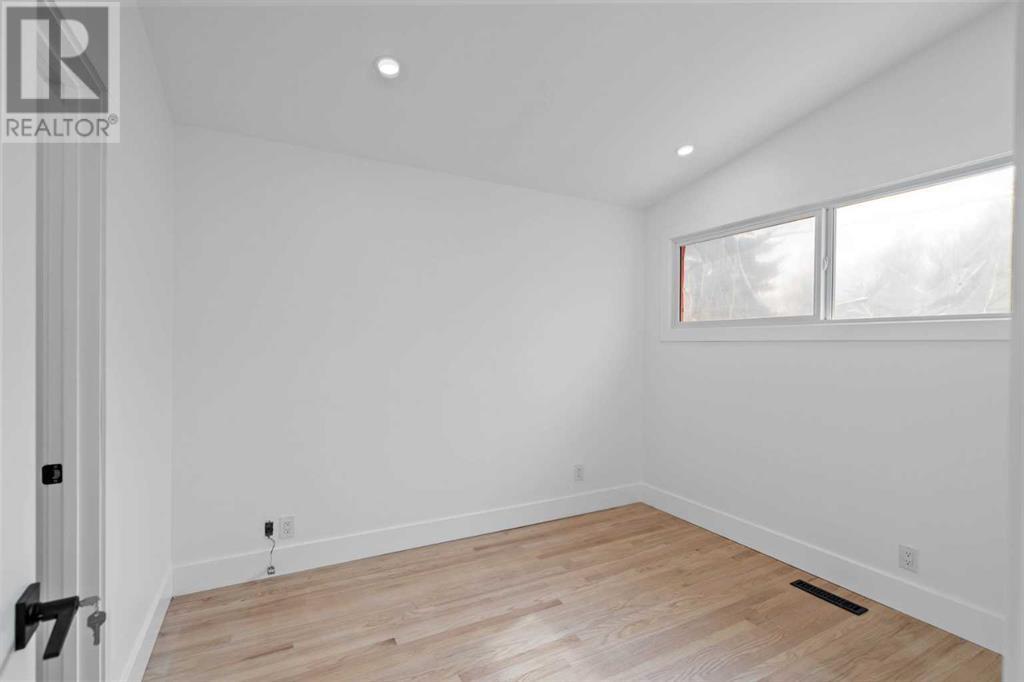 Single Family House Bungalow for Sale in  Lombardy Crescent SW North Glenmore Park Calgary 