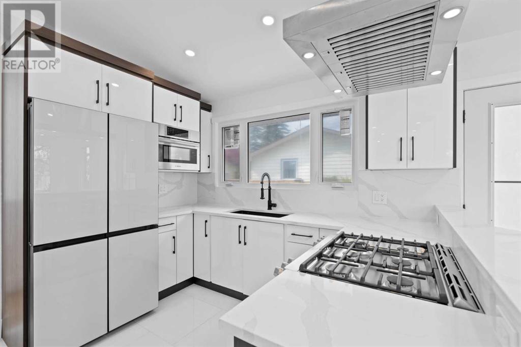 Single Family House Bungalow for Sale in  Lombardy Crescent SW North Glenmore Park Calgary 