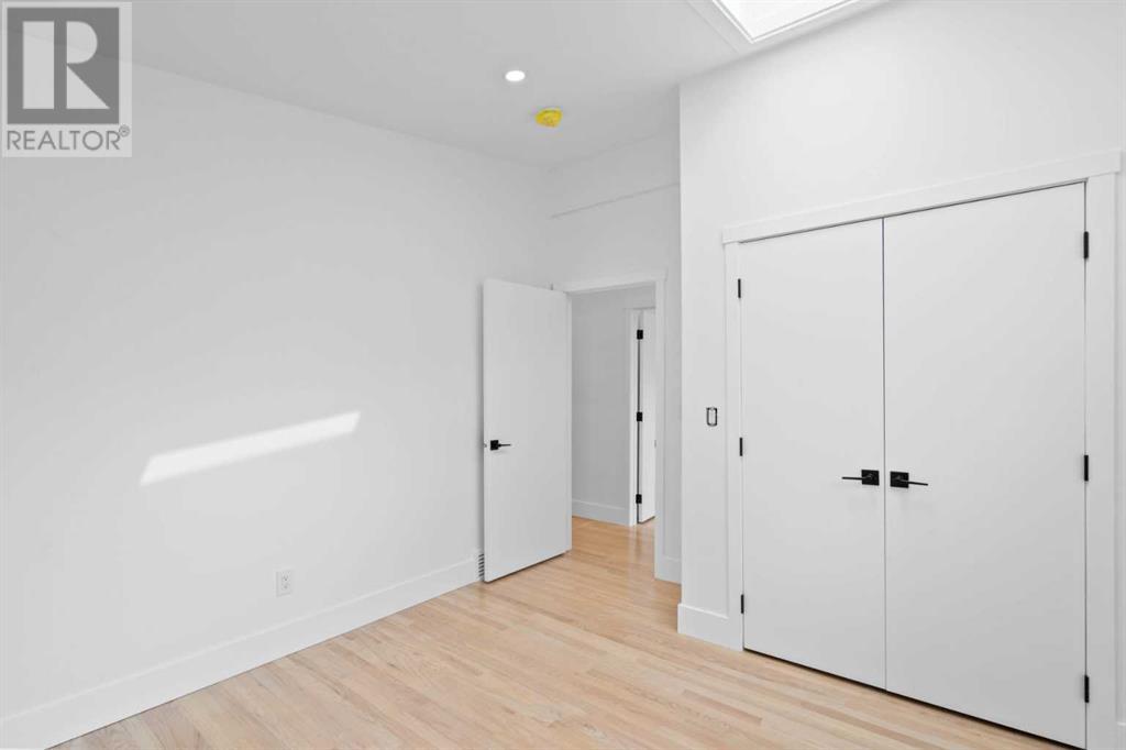 Single Family House Bungalow for Sale in  Lombardy Crescent SW North Glenmore Park Calgary 