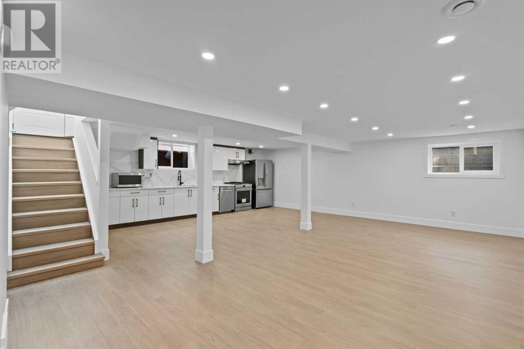Single Family House Bungalow for Sale in  Lombardy Crescent SW North Glenmore Park Calgary 