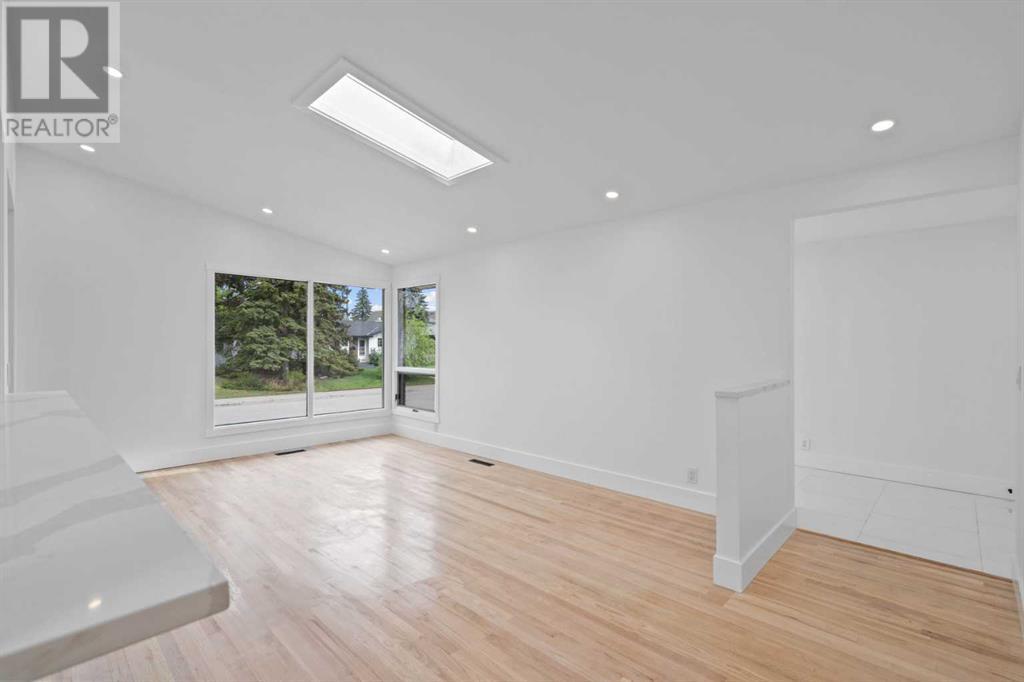 Single Family House Bungalow for Sale in  Lombardy Crescent SW North Glenmore Park Calgary 