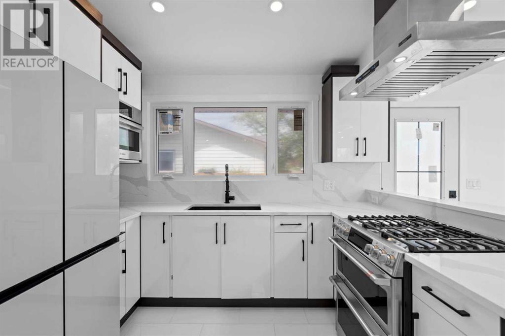 Single Family House Bungalow for Sale in  Lombardy Crescent SW North Glenmore Park Calgary 