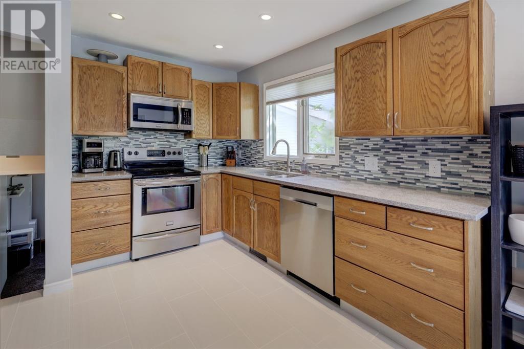 Single Family House 4 Level for Sale in  MacEwan Meadow Rise NW MacEwan Glen Calgary 