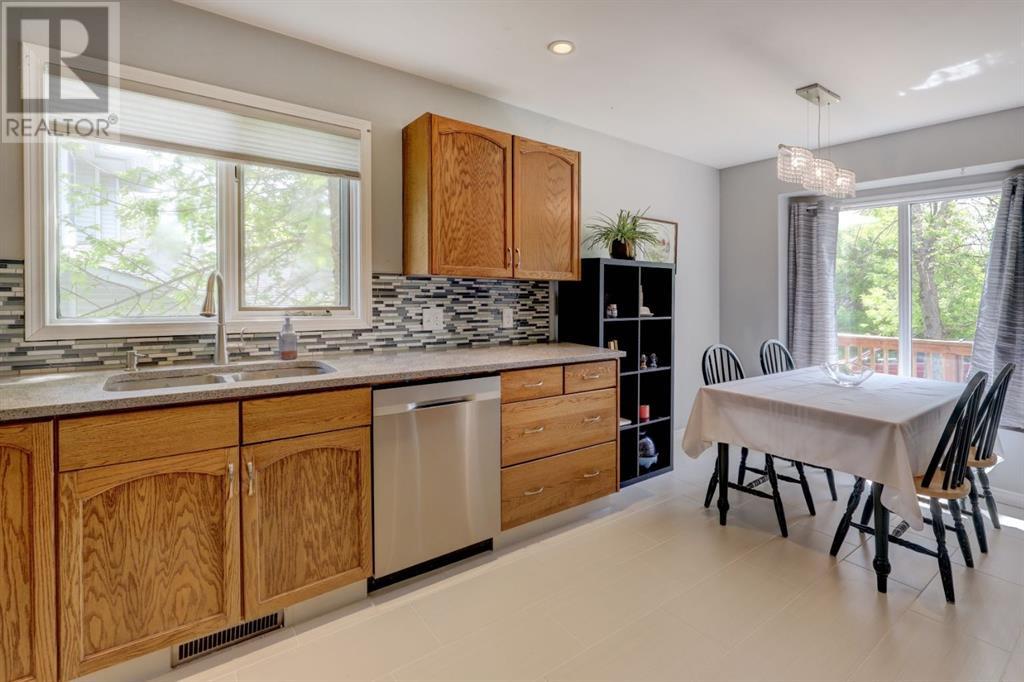 Single Family House 4 Level for Sale in  MacEwan Meadow Rise NW MacEwan Glen Calgary 