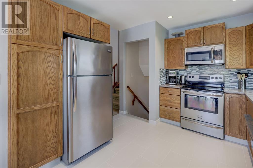 Single Family House 4 Level for Sale in  MacEwan Meadow Rise NW MacEwan Glen Calgary 